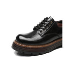 A23 black shoe upper and lace detail